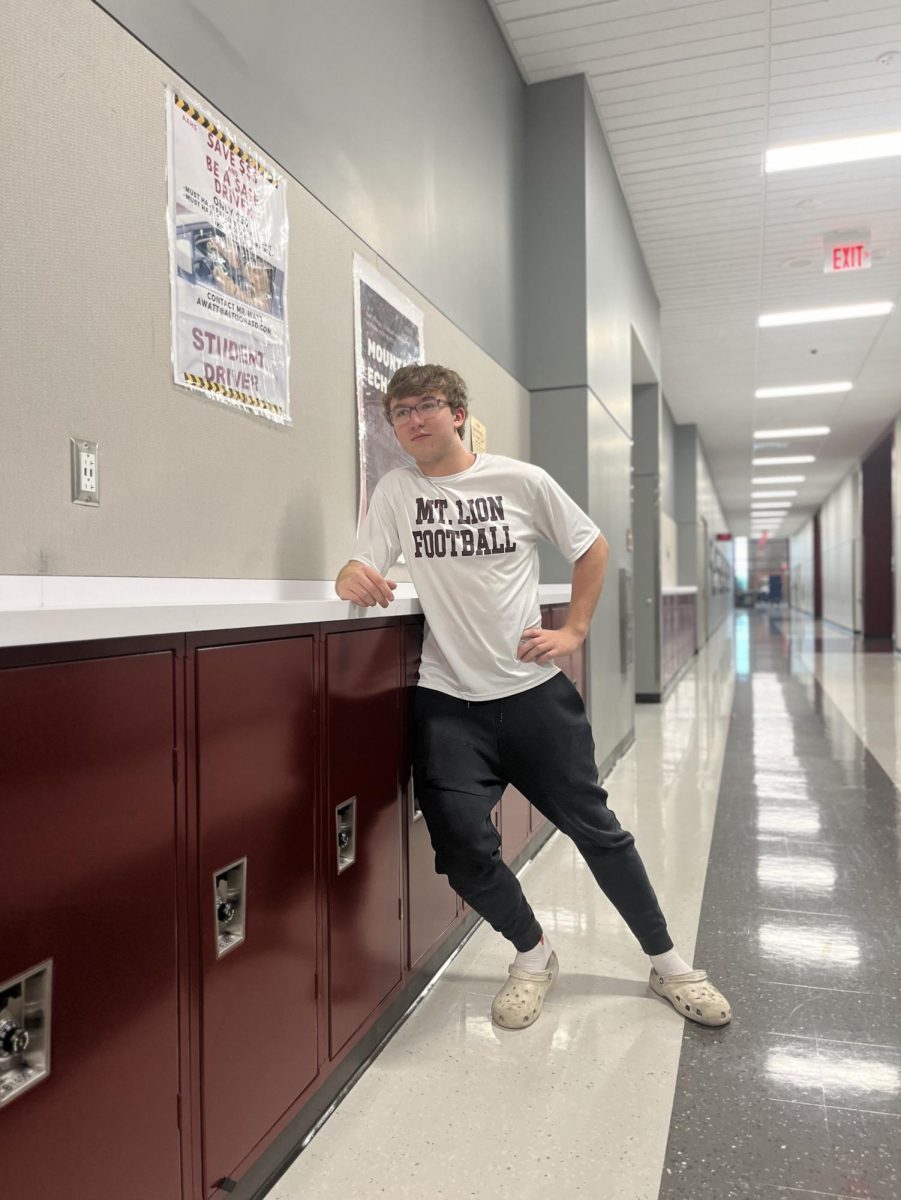 Junior Zachary Kerin poses for the camera in his altoona pride outfit.