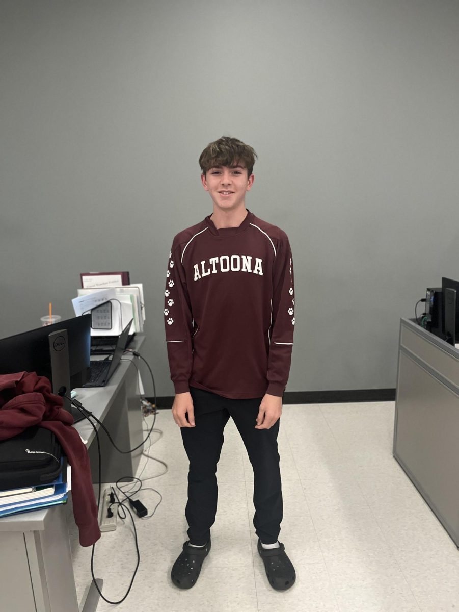 Sophomore Carter Keagy shows off his maroon and white gear.