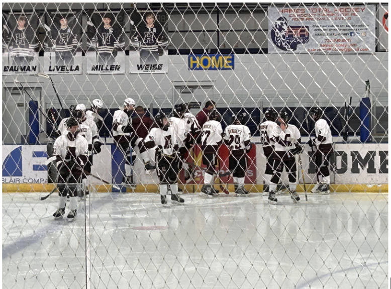 
Time to shine! During a junior varsity game, freshmen Parker Mirobelli and Lukas Uhmholtz go out on the ice to play defense and offense. Altoona didn't win this game, yet they still had a successful night with a score of 5-4. (Courtesy of Isabella Foor)
