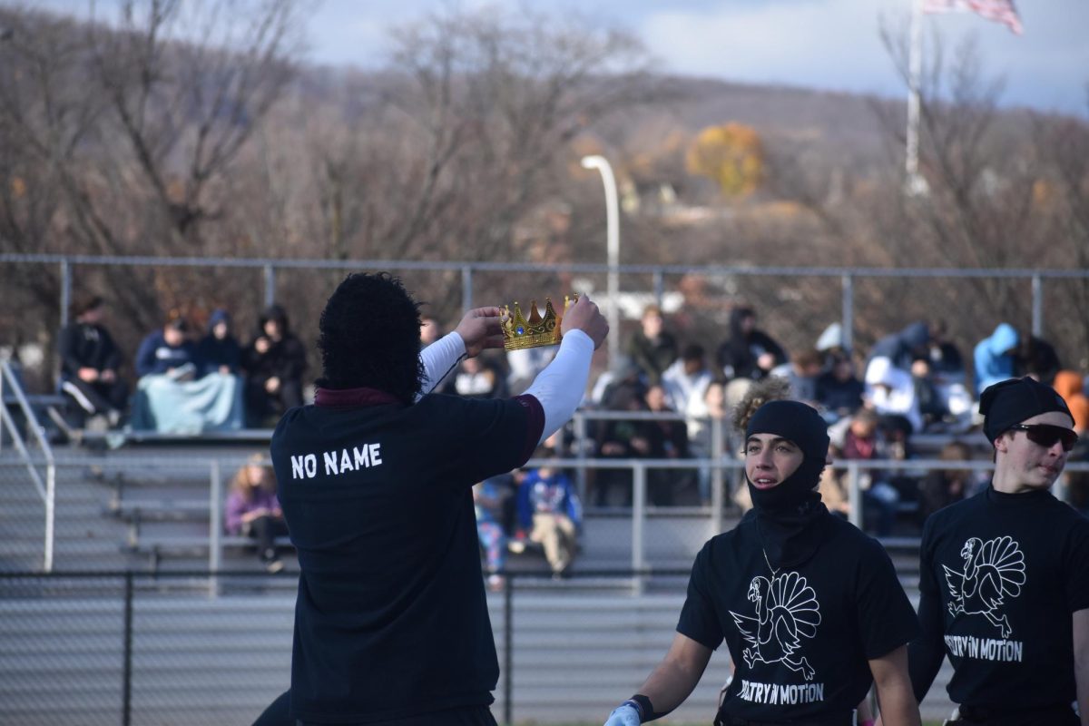 Crown Carmine. Senior Mark Harrington crowns senior Carmine Polito during the final round. Harrington and Polito were on Poultry in Motion. 