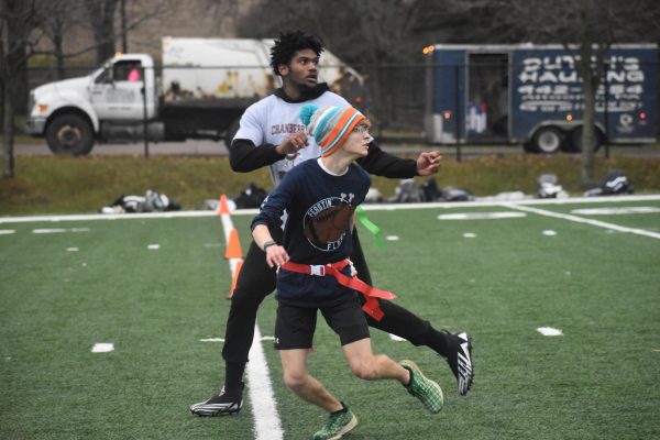 Quick Quinn. Senior Andrew Quinn and senior Xavier Midder attempt to catch the ball. Quinn was on Feastin' Flock and Midder was on Cranberry Crushers. 