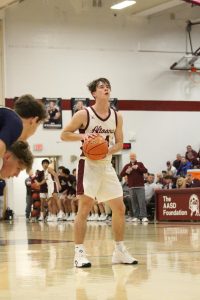 Focus in. Junior Parker White concentrates as he prepares to shoot. 