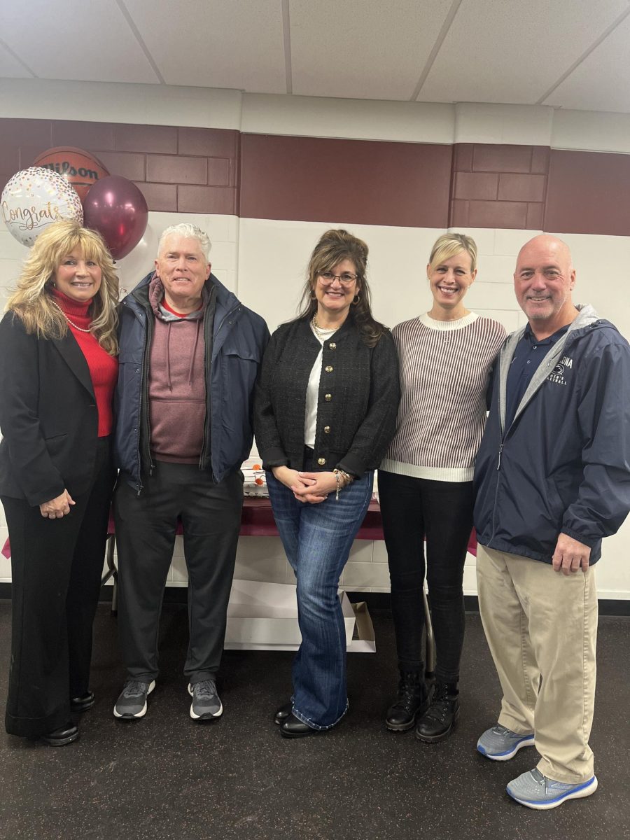 Coaches reunite. The Lady Lion's coaches over the years returned to the field house to celebrate 1,000 wins. 