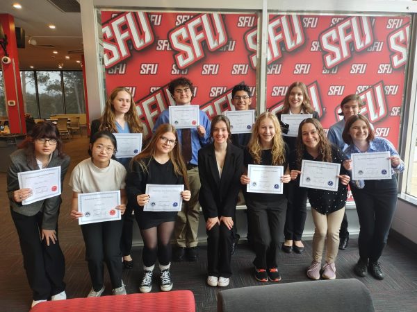 Success. Students pose at Saint Francis University after their regional competition. Several students placed and were recognized with cash prizes and certificates. (Courtesy of David Borst)