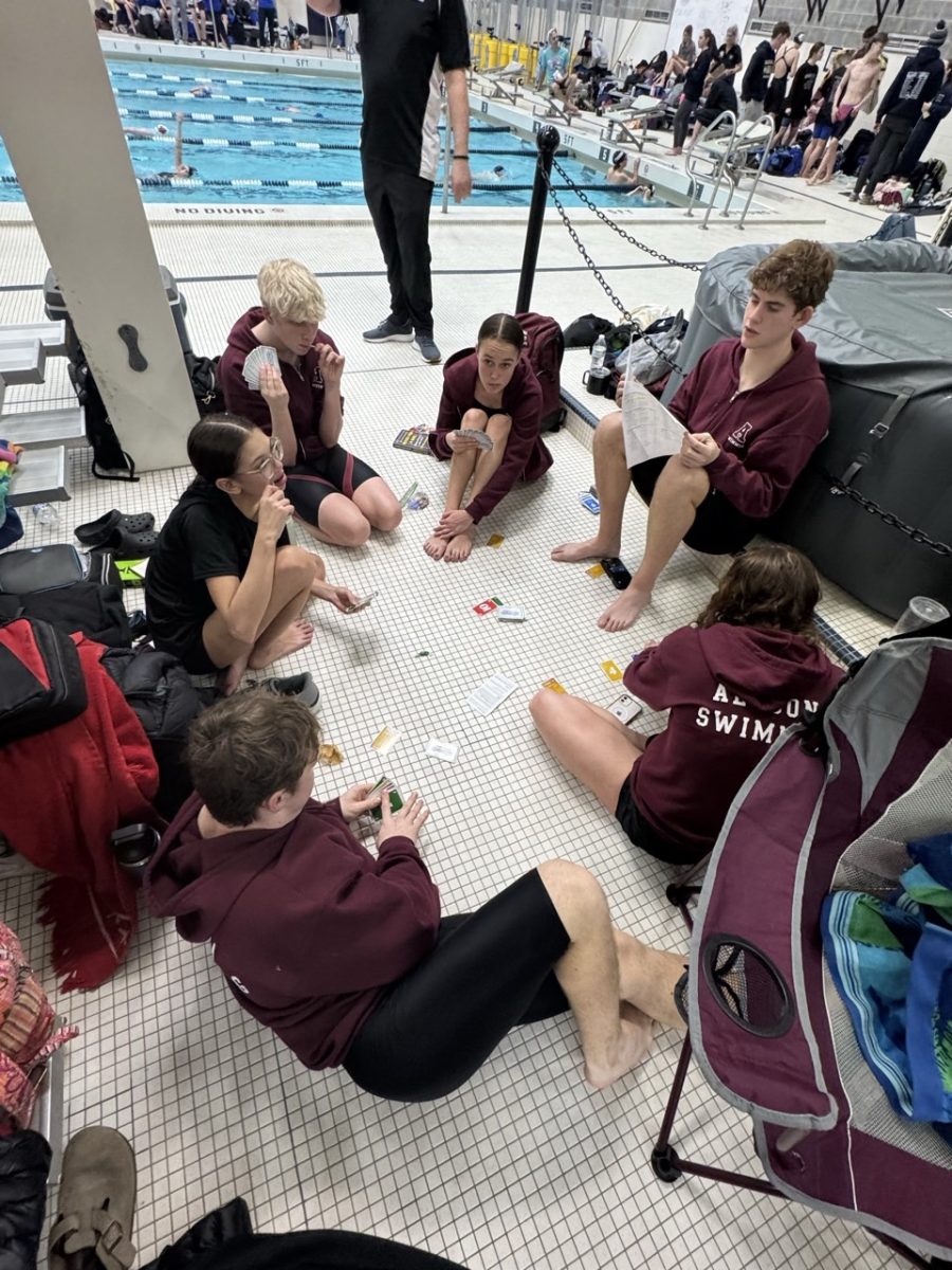 To pass the time swimmers play games. 