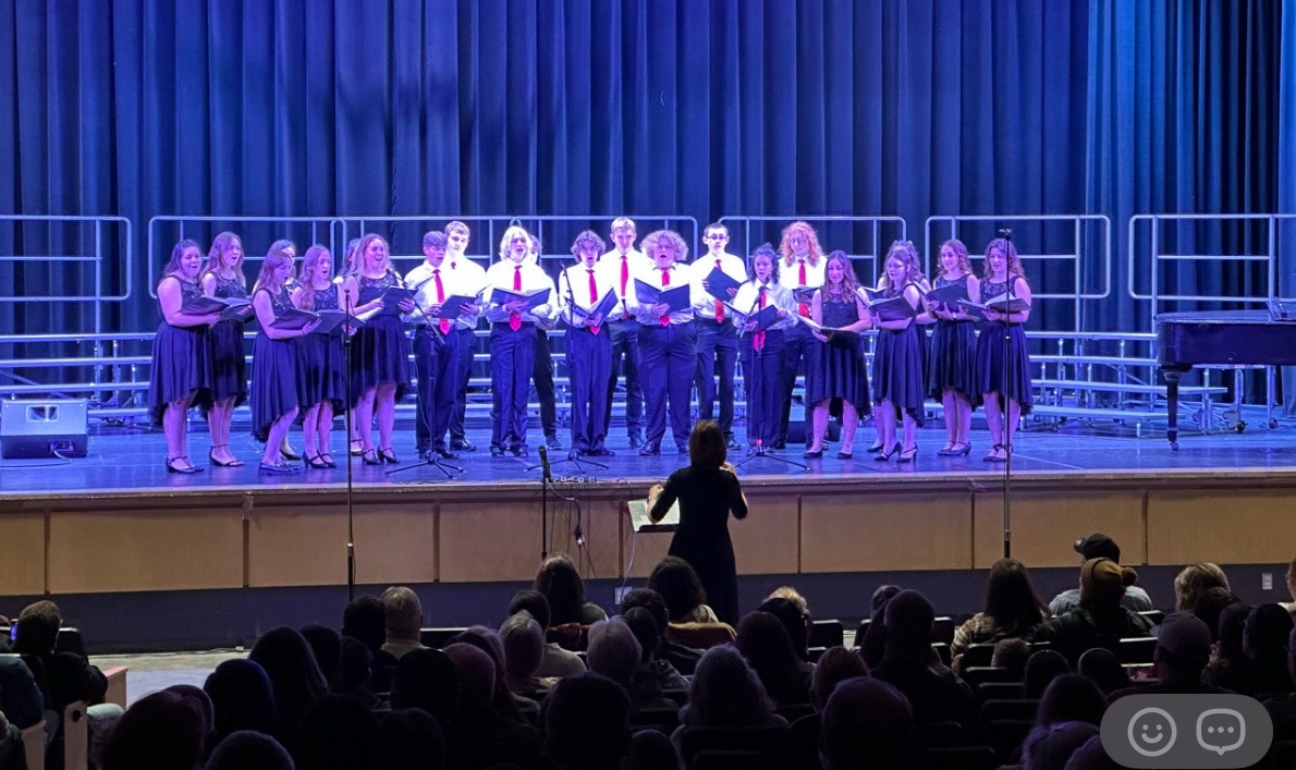 One last time. The Vocal Ensemble performs under the direction of Kelly Sipes, unaware it would be one of their final performances with her. (Courtesy of Kelly Sipes) 