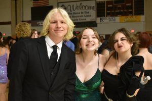 Sophomores Gregory Wenzel,  Lydia Wise and Gabriella Sparacino come together to capture a moment at Homecoming. Spring Fling is another chance to capture moments with your friends.