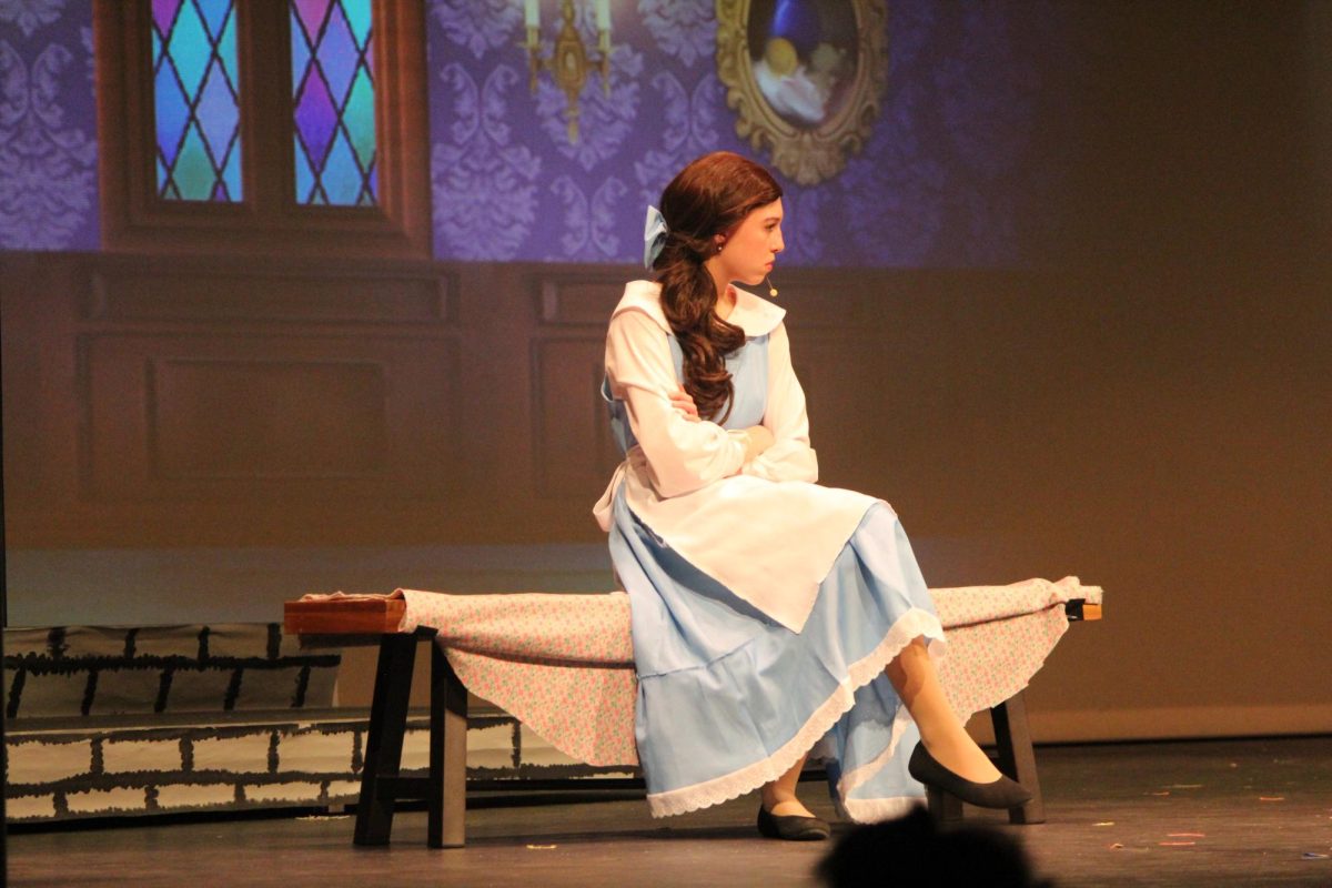 Beautiful Belle. Eighth grader Abby Berchfield plays Belle in the junior high musical. This musical started at 7 p.m. 