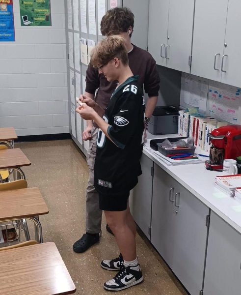 Hunting. Sophomore James Hord opens his egg during Alyssa Fasolo's 5th period. Hord received three bonus points