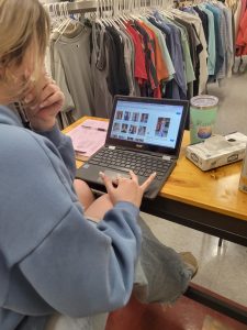 Perfectly Prom Ready. Senior Lucie Jones sits looking for a dress for Prom. With the event fast approaching she wishes to get a dress in time. 