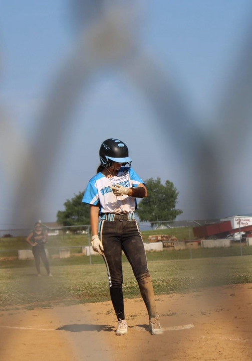 Swapping positions. Delozier plays left or right field for school ball. When it came to travel softball though, she played the center position. ( Courtesy Bridget Delozier )