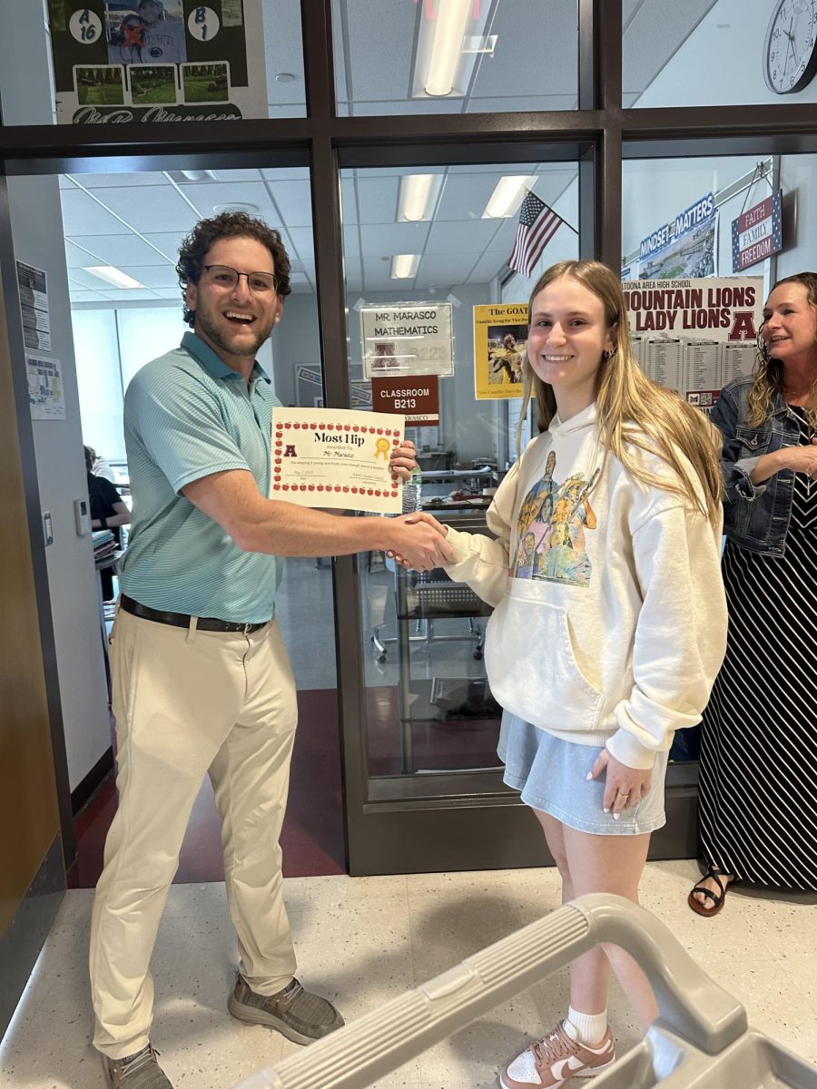 Smiles and laughter. Caleb Marasco earned the award for 'Most Hip.' Marasco teaches geometry. 