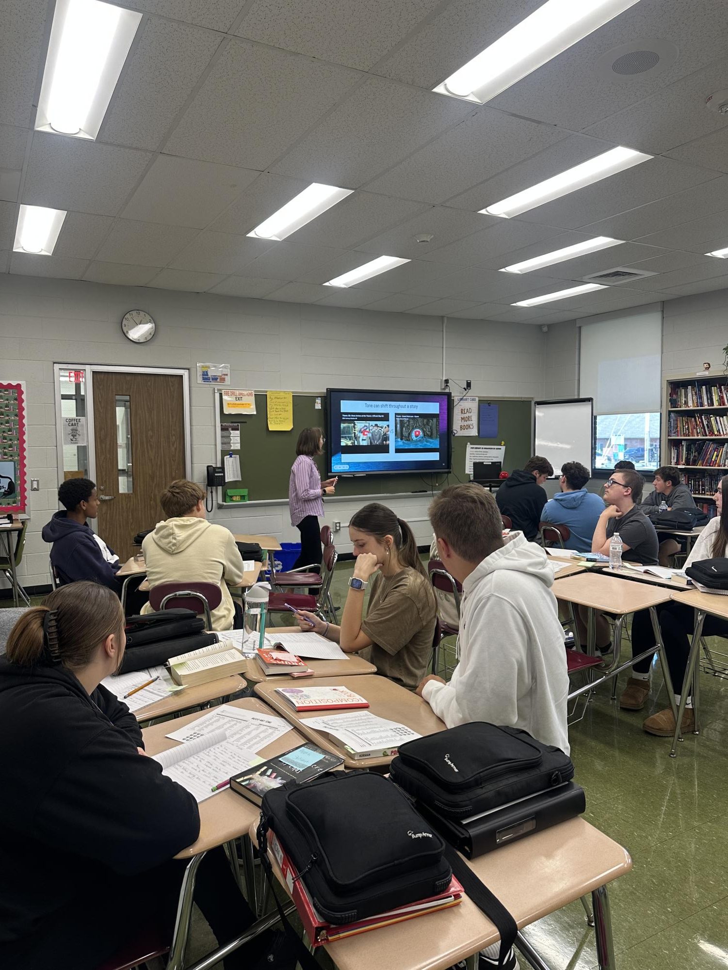 Important information. Sydnee Rockey teaches her sixth period English class about mood and tone as they take notes. 