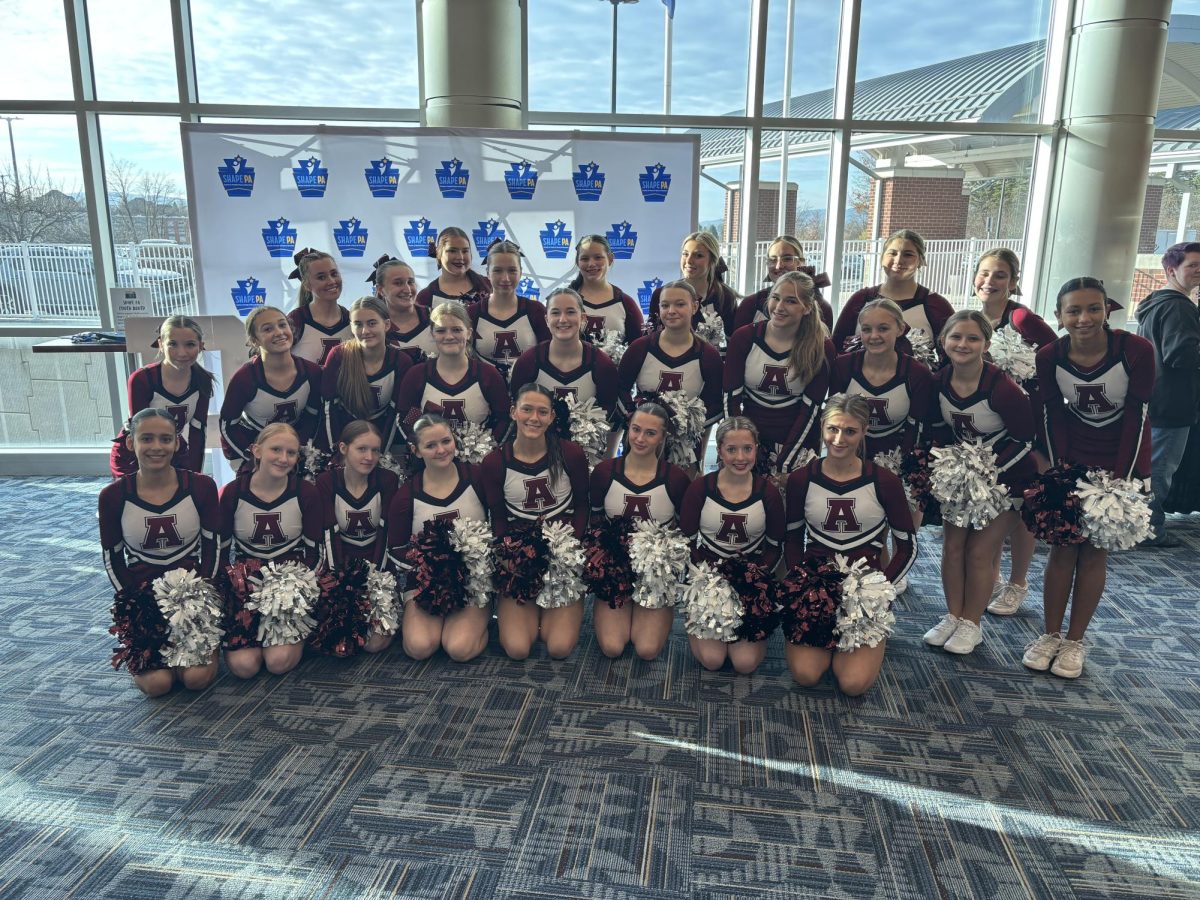 Cheer. The Altoona cheer team poses for a photo at the SHAPE PA conference on Nov. 14.