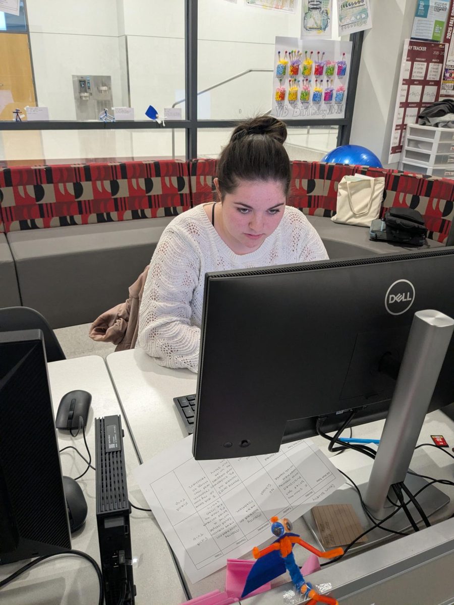 Striving for perfection. Editor-in-Chief Madison Aboud looks over and edits articles for the Mountain Echo. As an editor, Aboud is responsible for making sure that every article is up to the Mountain Echo standard before publishing.