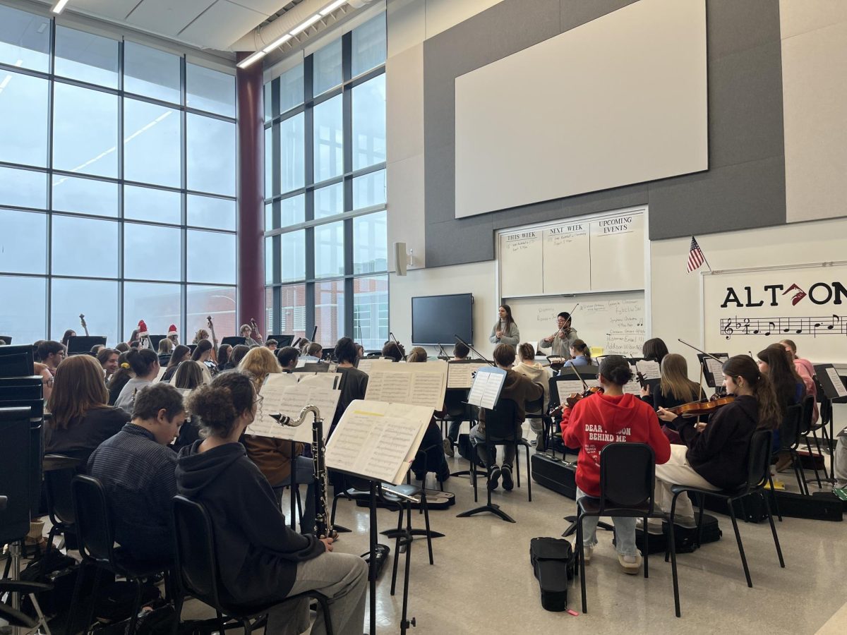 Holiday cheer. The music students practiced together in the band room around the holidays to prepare for their upcoming shows. 