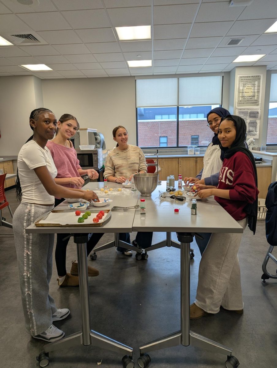 Strike a pose. FCCLA members pose for a photo before continuing their work. 