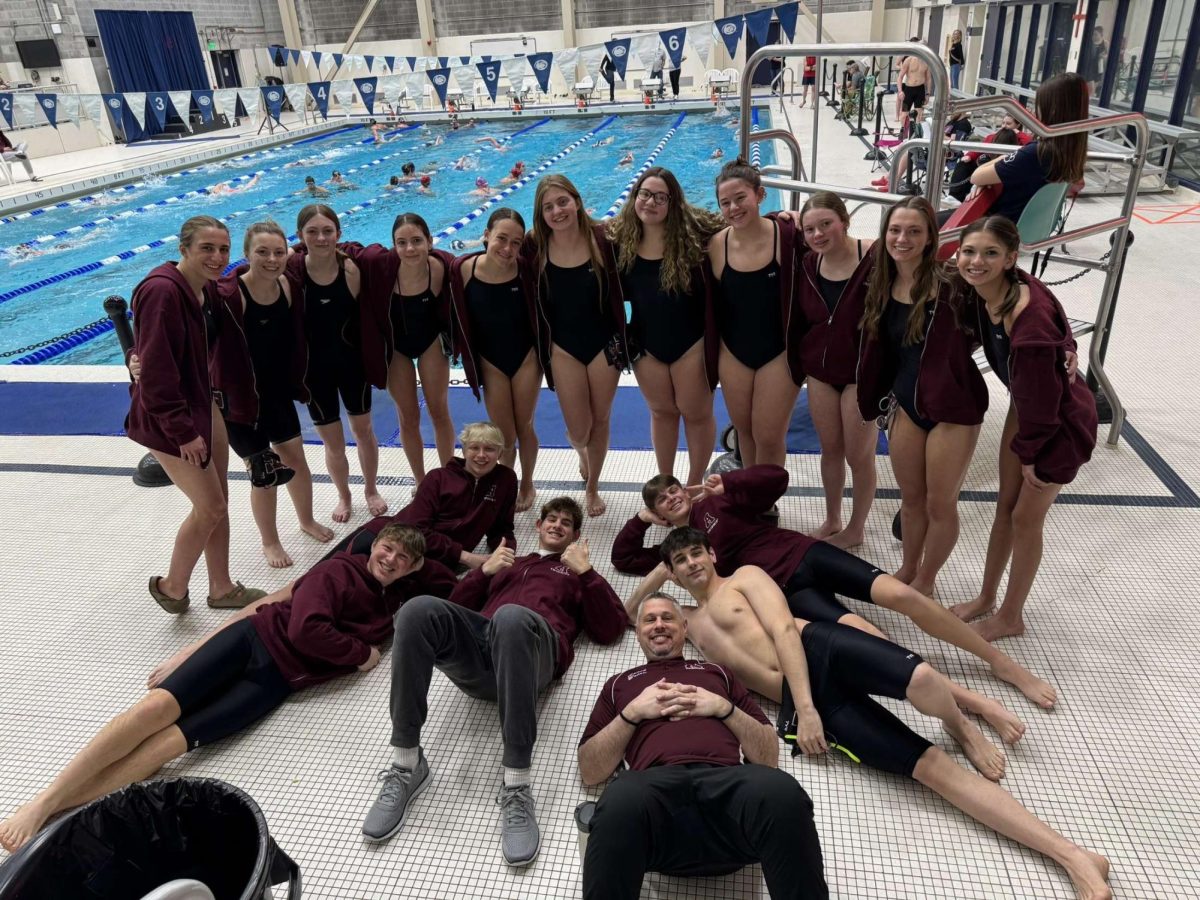 Districts.The team waits for their turn to warm up at the Penn State McCoy Natatorium. 15 swimmers attended districts last year. (Courtesy of Megan Yingling) 
