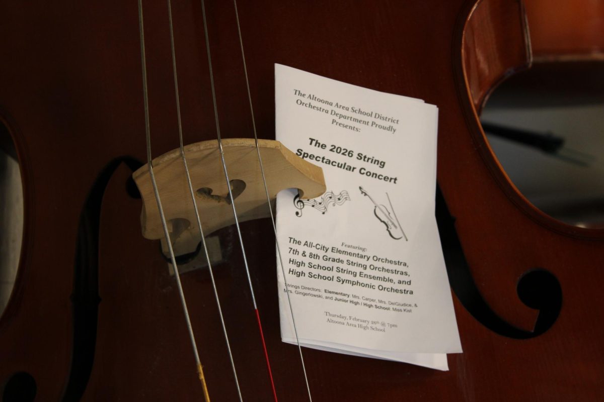Making music. The String Spectacular is an annual event where all orchestras in the district come together for an evening of music and memories. 