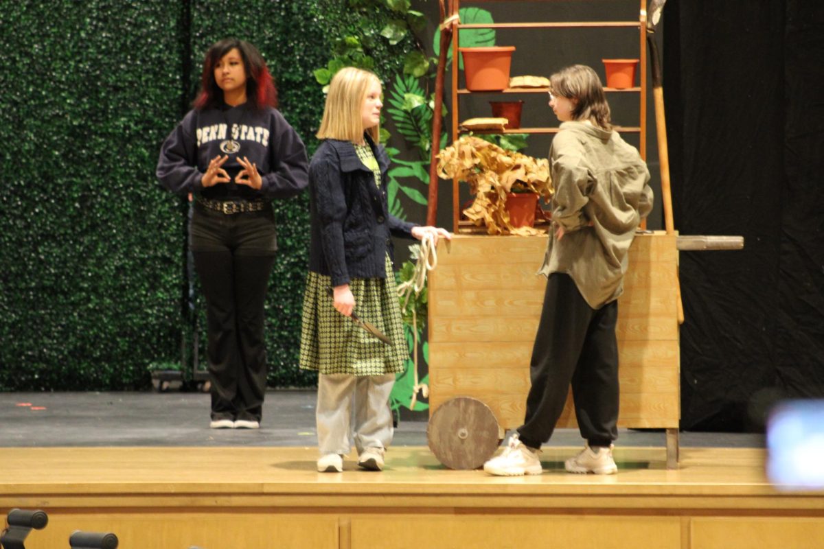 Stay there in the garden. Students rehearse for the spring musical, "The Secret Garden."