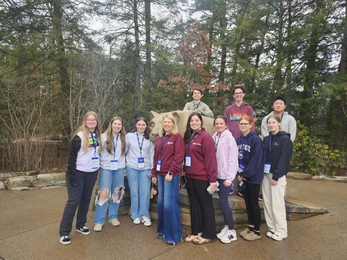State Finals Ten journalists from the Horseshoe and Mountain Echo staffs traveled to State College for the State Finals on March 16. Tanner LaMark competed in the editorial category and is pictured behind the statue.