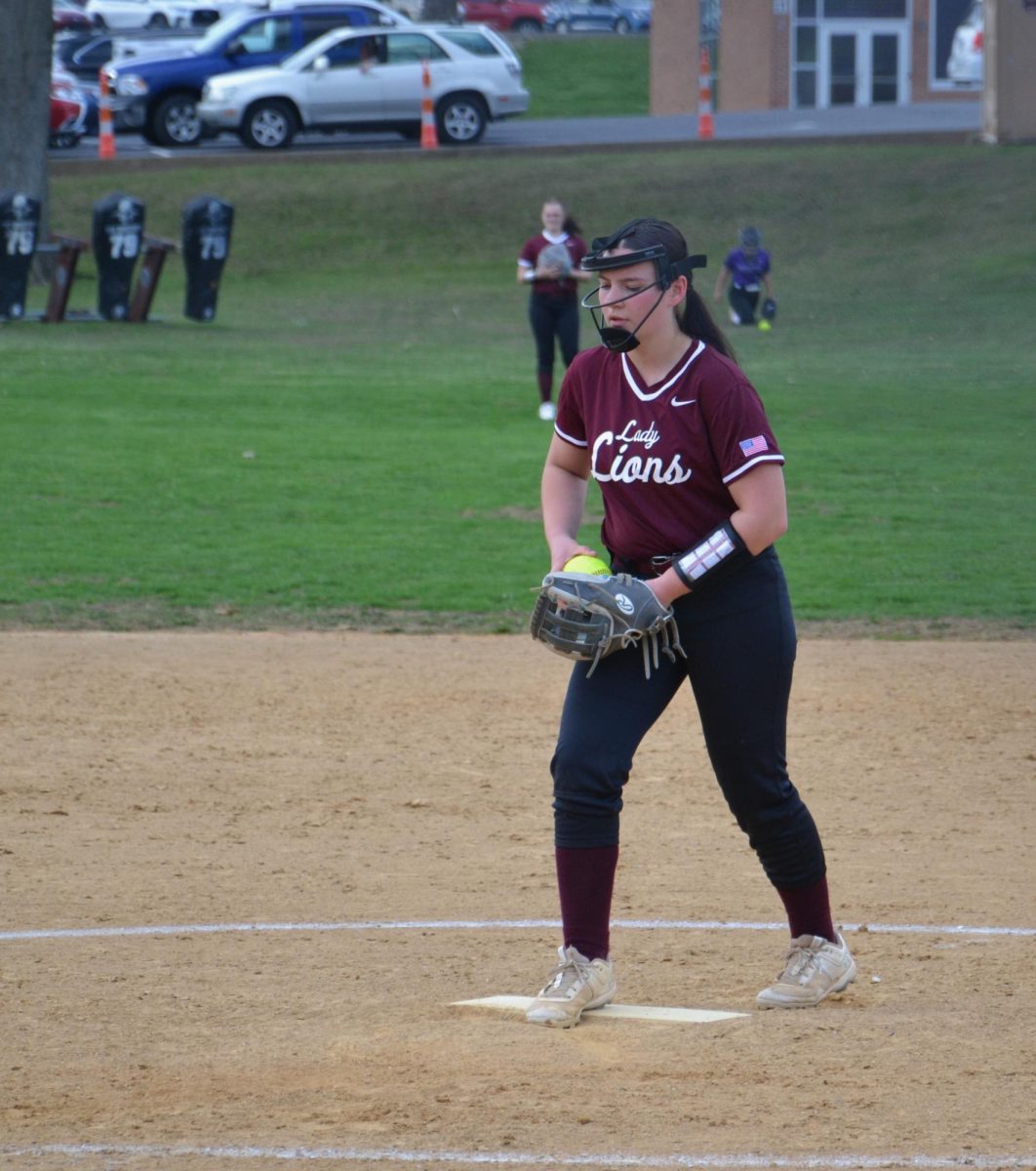 Freshman Emalyn Rickabaugh, starting pitcher, throws a fast ball. Starting pitchers are chosen based on their performance at practice. 