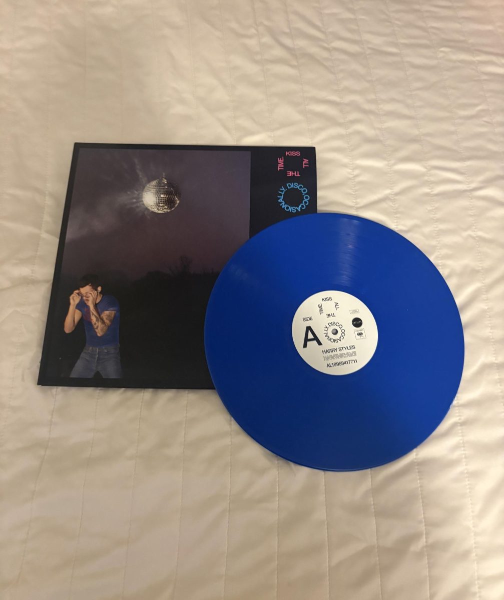 Harry Styles. This album released on March 6th, 2026. The target vinyl is a bright blue color.