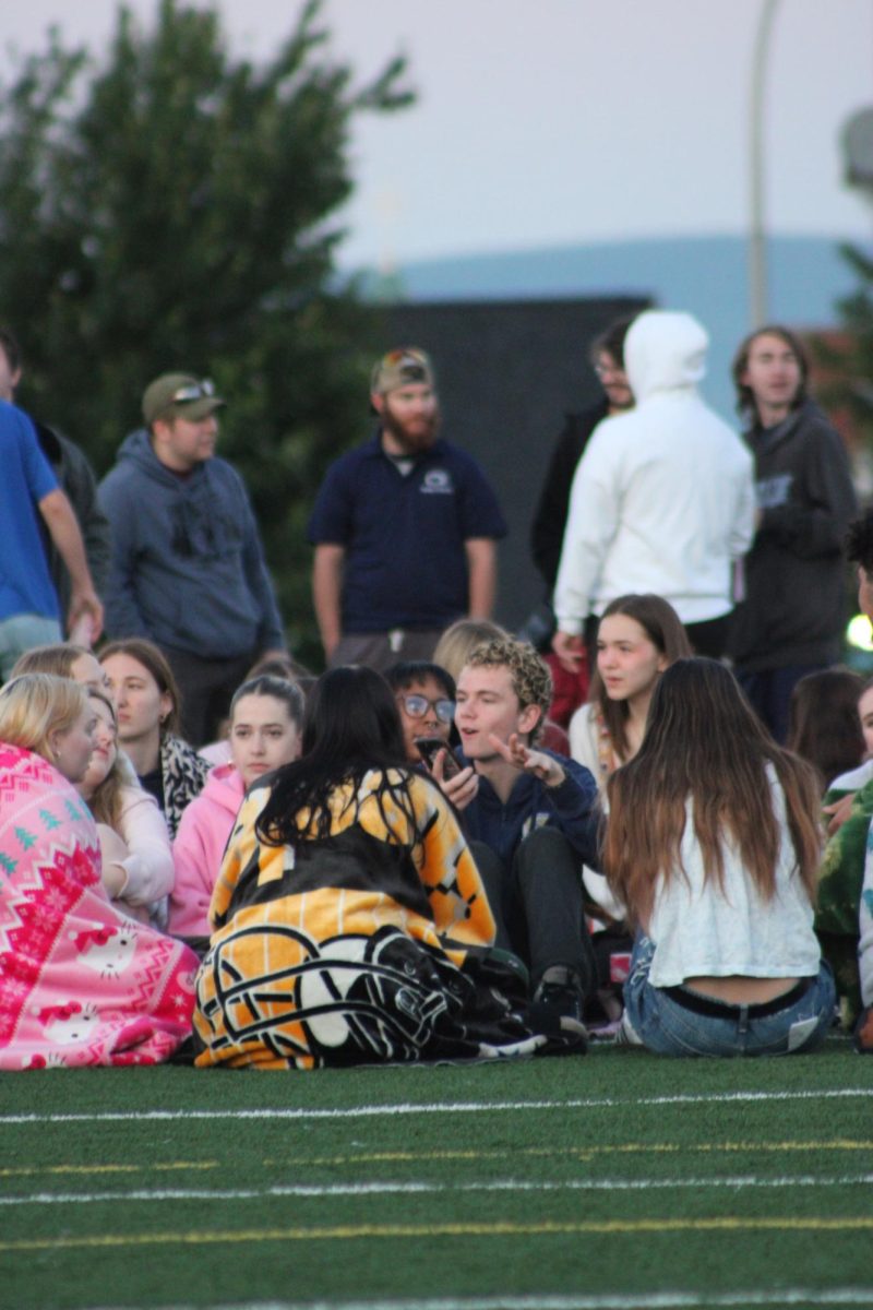 Before sunrise, seniors gathered on the Roosevelt field to start their day long celebration. Many brought blankets and warm clothes since the morning was chilly.